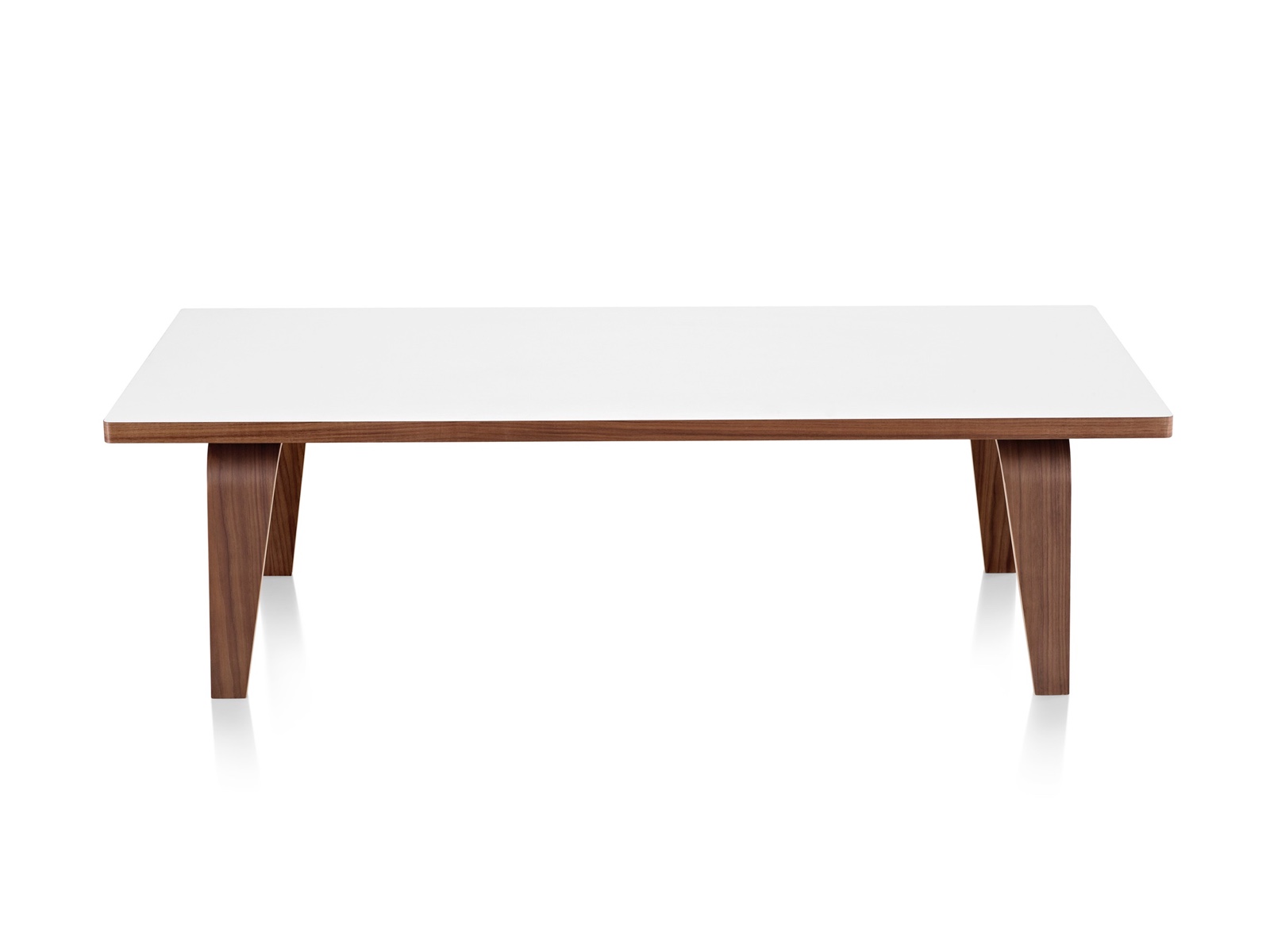 An Eames Rectangular Coffee Table with a white top and molded plywood legs in a medium finish. 